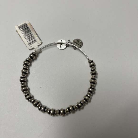 Alex and ANI Shiny Silver-tone NILE Metal BEADED Bangle Bracelet.
Bracelets - Picture 3 of 9